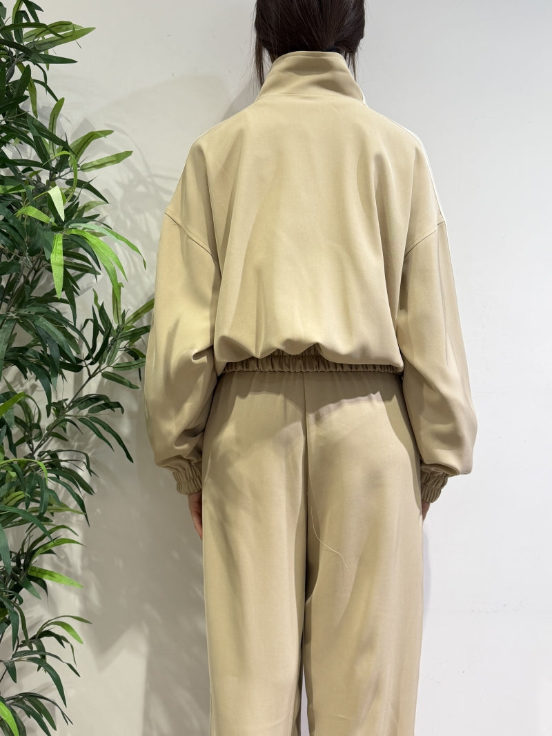 Tensione In - Bomber tuta con bande laterali beige
