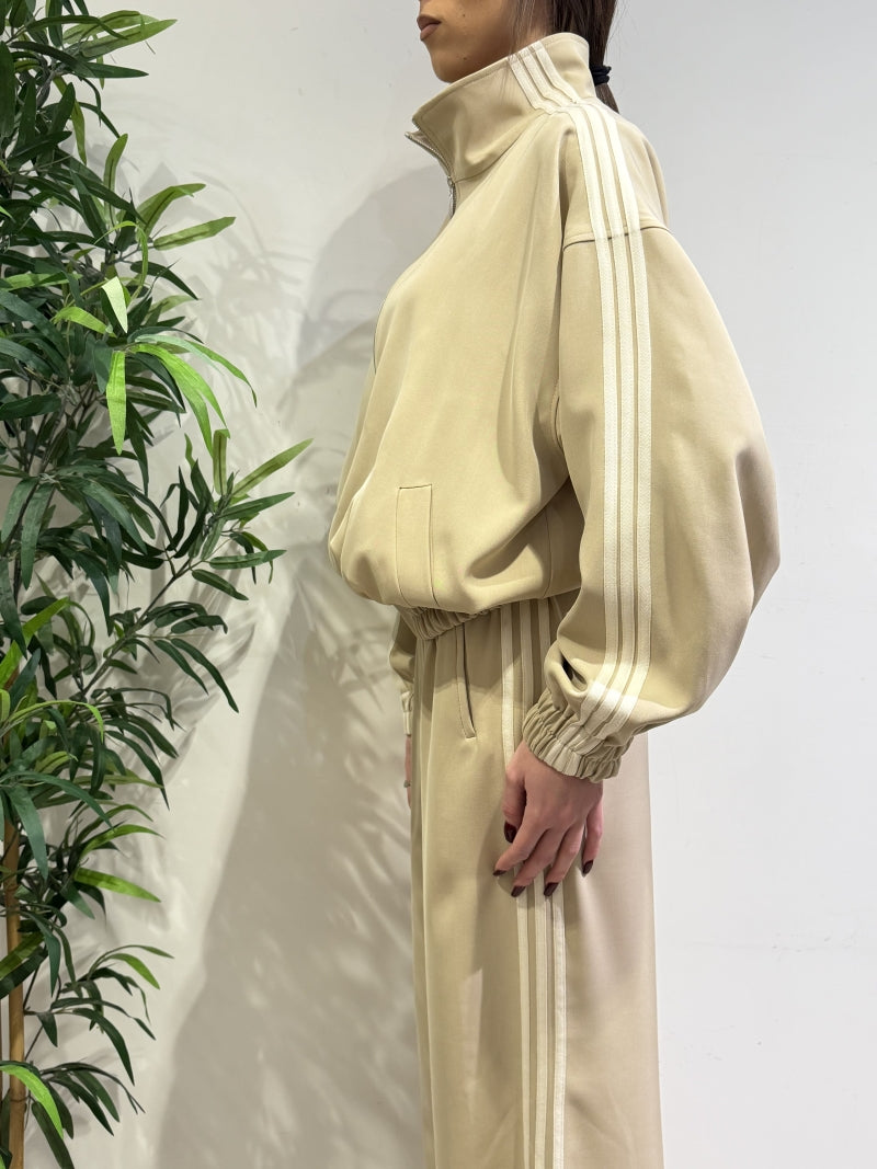 Tensione In - Bomber tuta con bande laterali beige